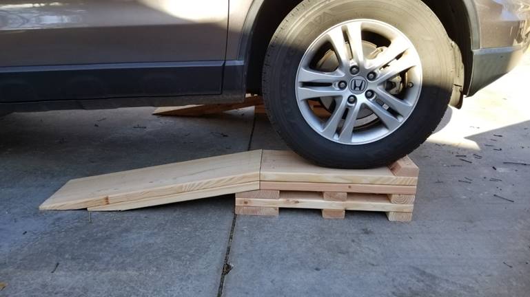 A picture containing outdoor, ground, road, building

Description generated with very high confidence